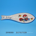 Soporte de cuchara de cerámica de alta calidad con diseño de pescado